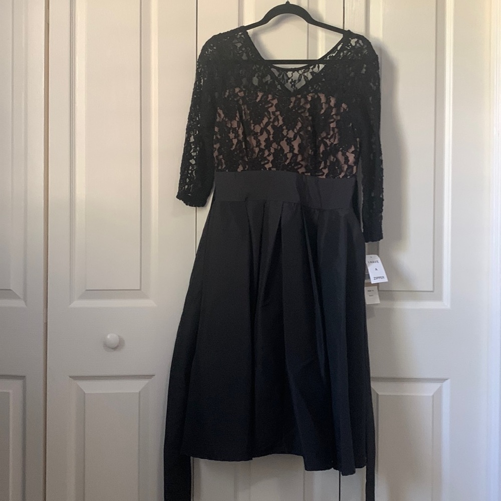 Black formal dress. Size 12. S.L. Fashions.